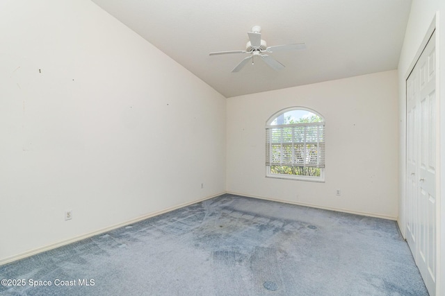 1523 Tippicanoe Ct, Melbourne, FL 32940 - unfurnished bedroom featuring lofted ceiling, light carpet, a closet, and baseboards