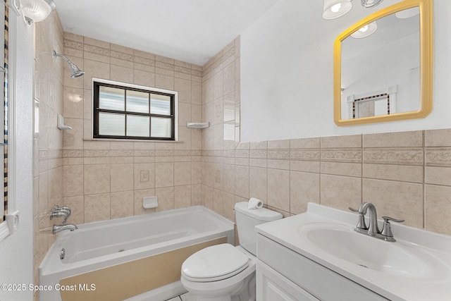 bathroom with toilet, tile walls, shower / tub combination, and vanity