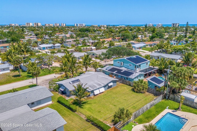 drone / aerial view with a city view and a residential view