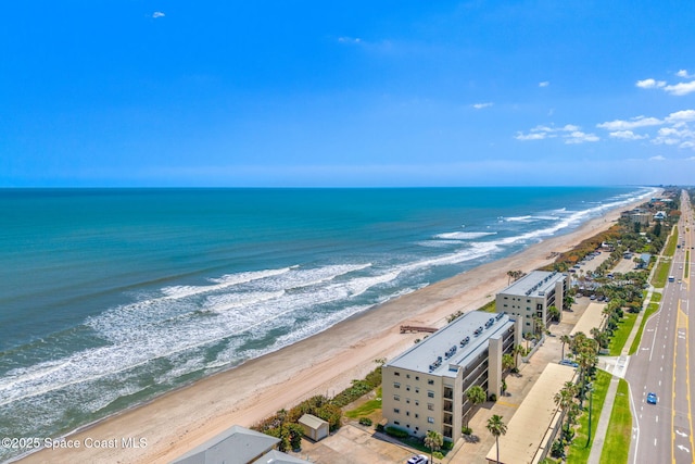 aerial view with a view of the beach and a water view