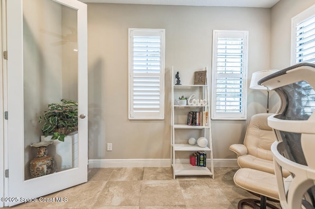 7447 Bluemink Ln, Melbourne, FL 32940 - sitting room featuring baseboards