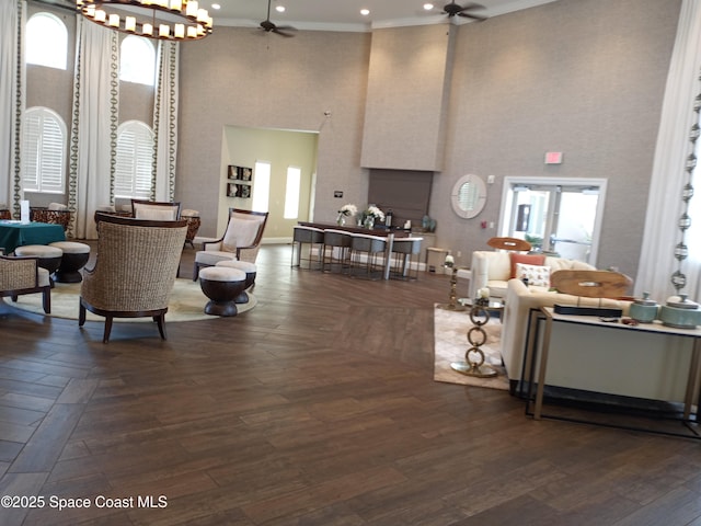 7447 Bluemink Ln, Melbourne, FL 32940 - common area with a towering ceiling, recessed lighting, and ornamental molding