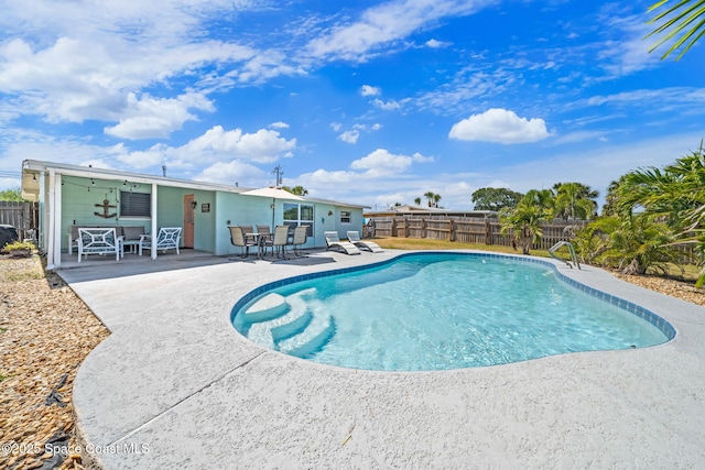 1380 Fiddler Ave, Merritt Island, FL 32952 - view of pool featuring a patio, a fenced backyard, and a fenced in pool