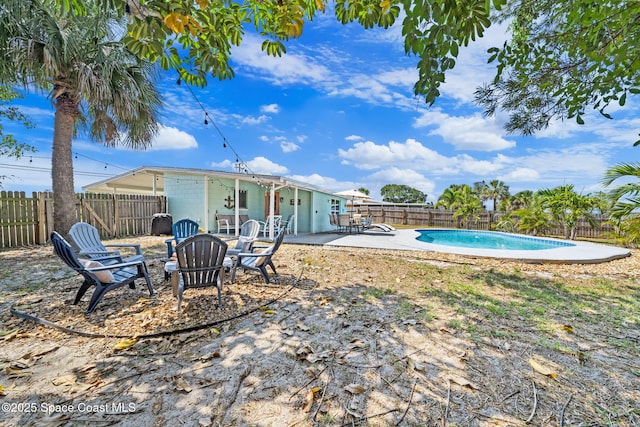 1380 Fiddler Ave, Merritt Island, FL 32952 - view of pool featuring a fenced backyard, a fenced in pool, and a patio area