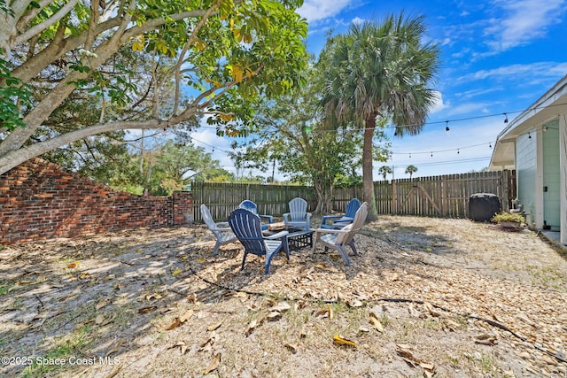 1380 Fiddler Ave, Merritt Island, FL 32952 - view of yard featuring a fenced backyard