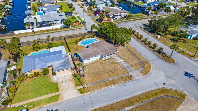 1380 Fiddler Ave, Merritt Island, FL 32952 - bird's eye view with a water view and a residential view
