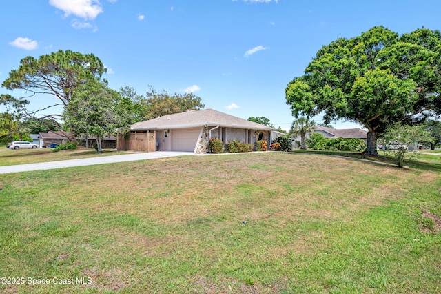 single story home with driveway, an attached garage, a front lawn, and stone siding