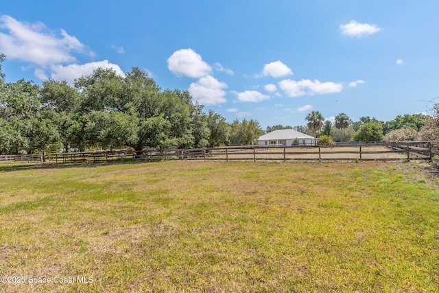 5635 N Tropical Trl, Merritt Island, FL 32953 - view of yard featuring fence and a rural view