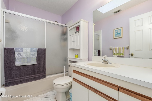 full bathroom featuring visible vents, vanity, marble finish floor, toilet, and bath / shower combo with glass door