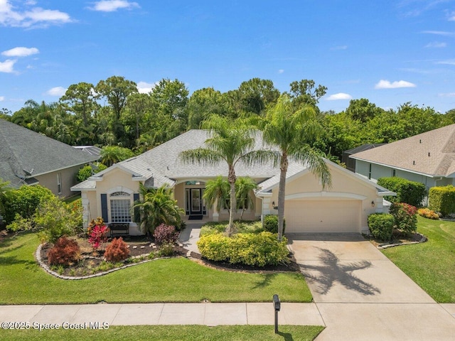 single story home with an attached garage, stucco siding, concrete driveway, and a front lawn