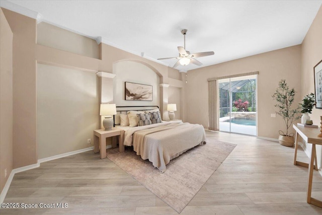 1019 Worthington Spring Dr, Melbourne, FL 32940 - bedroom featuring access to outside, light wood-style floors, baseboards, and a ceiling fan