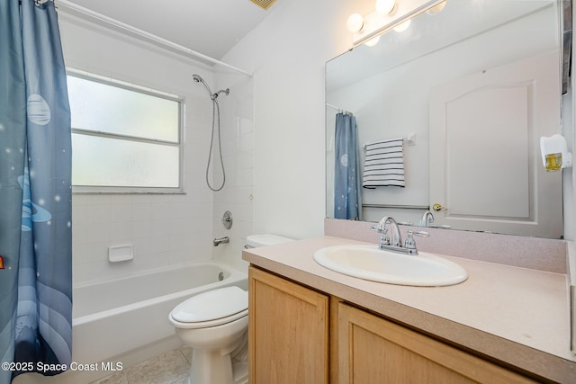 full bath with vanity, shower / tub combo with curtain, tile patterned flooring, and toilet