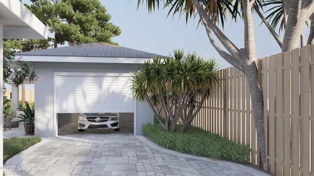 2059 Barracuda Ave, Melbourne Beach, FL 32951 - garage with decorative driveway and fence