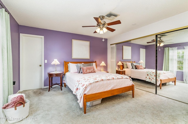 4001 Bayberry Dr, Melbourne, FL 32901 - carpeted bedroom featuring a ceiling fan, visible vents, and a closet