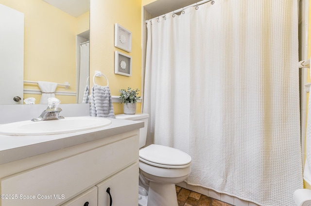 4001 Bayberry Dr, Melbourne, FL 32901 - bathroom featuring vanity, toilet, and shower / tub combo
