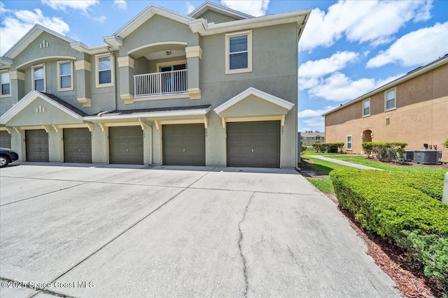 4016 Meander Pl Unit 207, Rockledge, FL 32955 - multi unit property featuring stucco siding, driveway, a balcony, and cooling unit