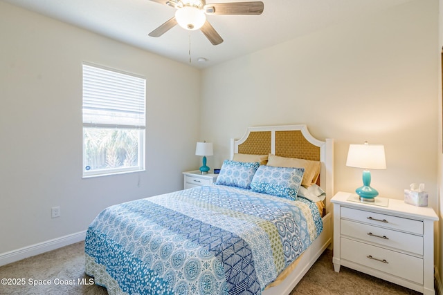 bedroom featuring baseboards, carpet, and a ceiling fan