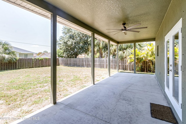 view of patio featuring a fenced backyard and ceiling fan