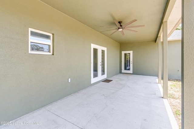 view of patio featuring ceiling fan