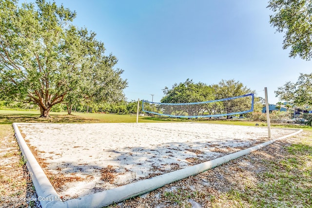 2801 Saint James Ln, Melbourne, FL 32935 - view of community featuring volleyball court and a lawn