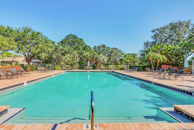 2801 Saint James Ln, Melbourne, FL 32935 - community pool with fence and a patio