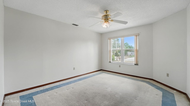 2615 Slash Pine Ct, Titusville, FL 32780 - carpeted empty room with baseboards, a ceiling fan, a textured ceiling, and visible vents