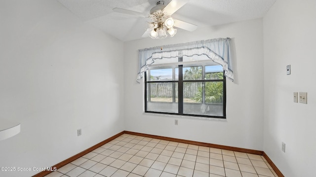 2615 Slash Pine Ct, Titusville, FL 32780 - empty room with baseboards, a textured ceiling, and ceiling fan