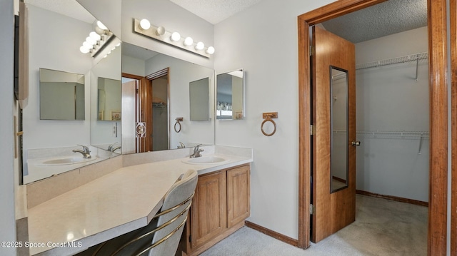 2615 Slash Pine Ct, Titusville, FL 32780 - bathroom with a textured ceiling and a spacious closet
