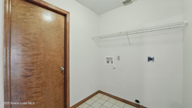 2615 Slash Pine Ct, Titusville, FL 32780 - laundry area with laundry area, visible vents, light tile patterned flooring, washer hookup, and hookup for an electric dryer
