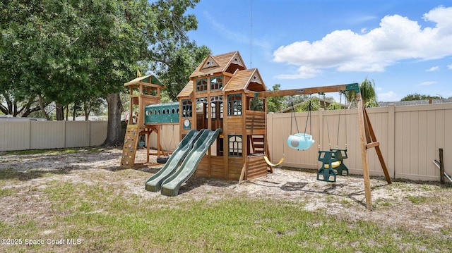 view of playground featuring fence