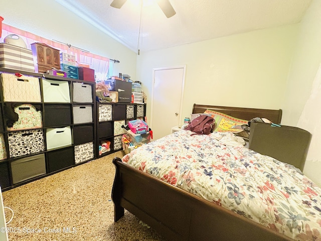 carpeted bedroom with ceiling fan and lofted ceiling