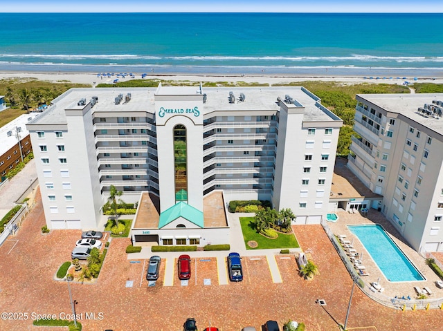 aerial view with a beach view and a water view