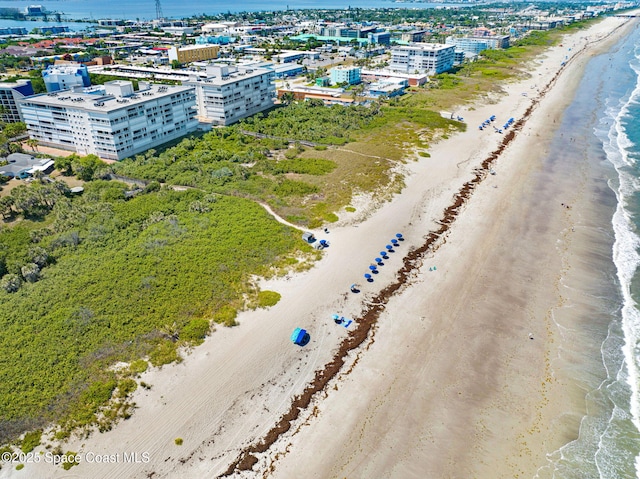 aerial view featuring a beach view and a water view