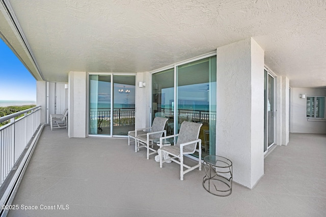 balcony featuring baseboard heating