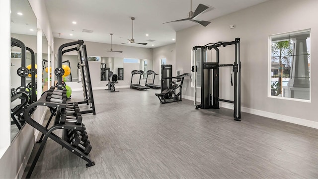 exercise room with recessed lighting, ceiling fan, and baseboards