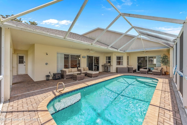 3502 Tipperary Dr, Merritt Island, FL 32953 - swimming pool with an outdoor hangout area, ceiling fan, and a patio