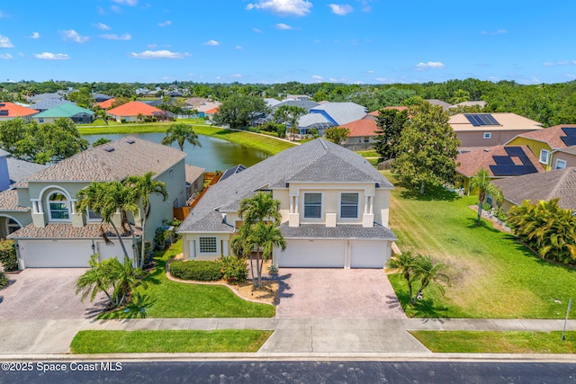 3502 Tipperary Dr, Merritt Island, FL 32953 - aerial view of residential area featuring a large body of water
