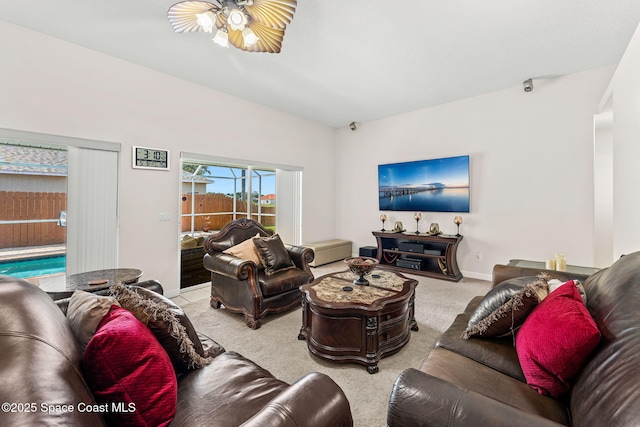 3502 Tipperary Dr, Merritt Island, FL 32953 - carpeted living room featuring ceiling fan and baseboards