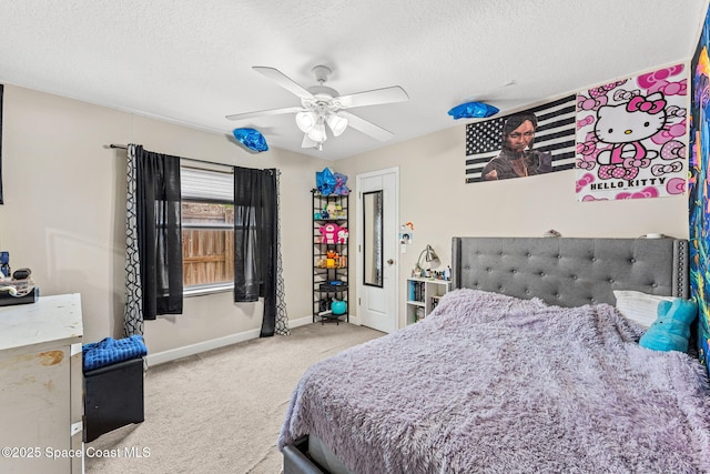 3502 Tipperary Dr, Merritt Island, FL 32953 - bedroom featuring light carpet, baseboards, a textured ceiling, and a ceiling fan