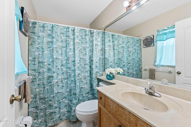 3502 Tipperary Dr, Merritt Island, FL 32953 - full bath with toilet, tile patterned flooring, vanity, a textured ceiling, and a shower with shower curtain