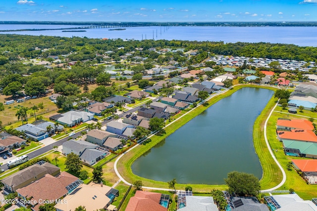3502 Tipperary Dr, Merritt Island, FL 32953 - aerial perspective of suburban area featuring a large body of water