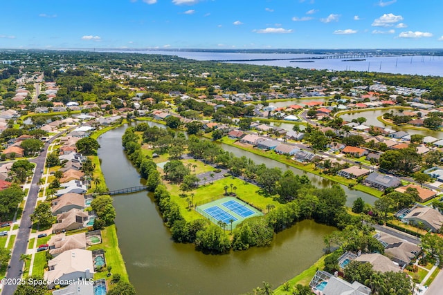 3502 Tipperary Dr, Merritt Island, FL 32953 - aerial view of residential area with a large body of water