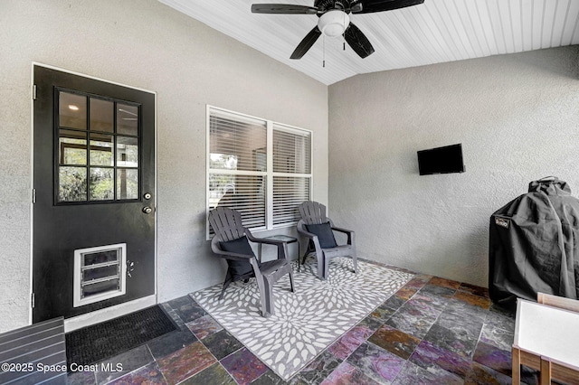 view of patio / terrace featuring ceiling fan