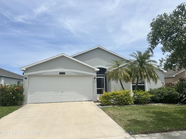 ranch-style house featuring a garage, stucco siding, driveway, and a front yard