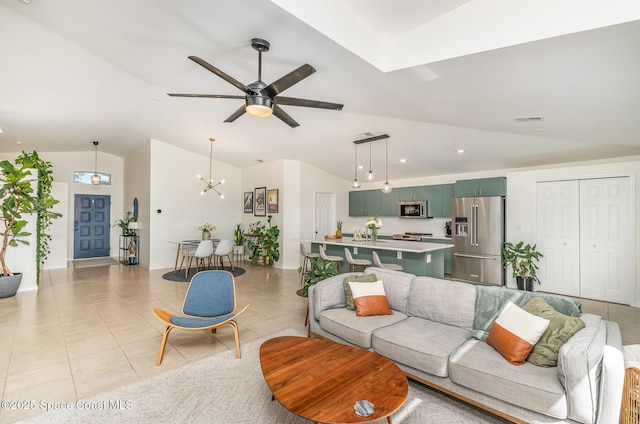 2464 Bayhill Dr, Melbourne, FL 32940 - living area featuring vaulted ceiling, light tile patterned floors, recessed lighting, ceiling fan, and a chandelier