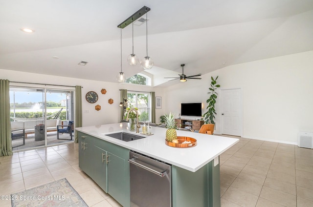 2464 Bayhill Dr, Melbourne, FL 32940 - kitchen with a sink, stainless steel dishwasher, vaulted ceiling, light tile patterned floors, and green cabinets