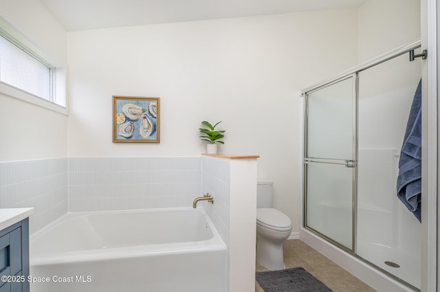 2464 Bayhill Dr, Melbourne, FL 32940 - bathroom with toilet, a bath, vanity, tile patterned floors, and a stall shower