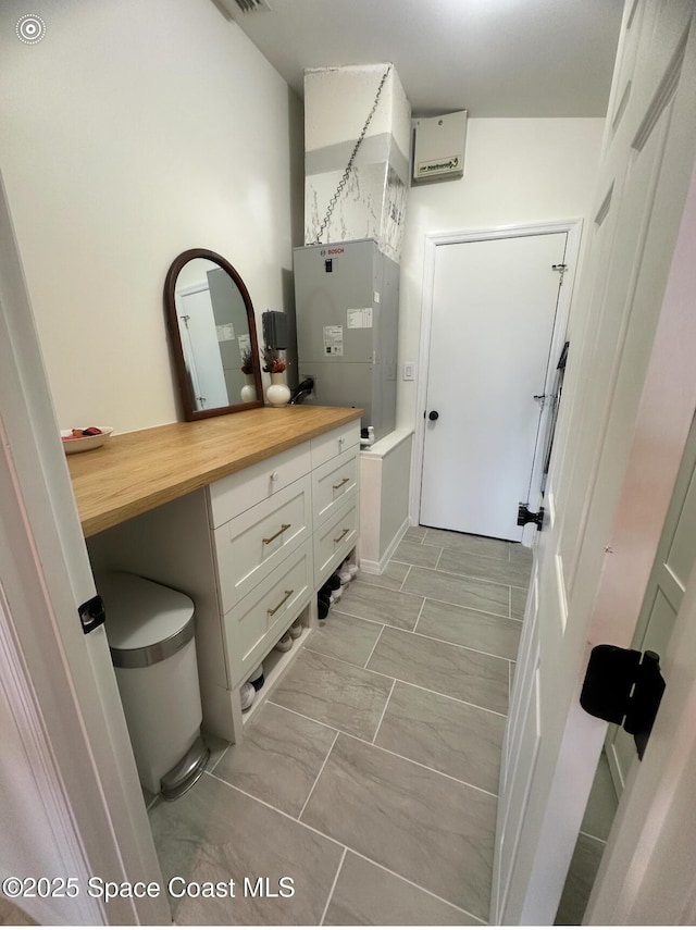 2464 Bayhill Dr, Melbourne, FL 32940 - mudroom with heating unit