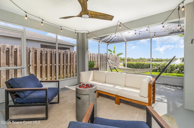 2464 Bayhill Dr, Melbourne, FL 32940 - sunroom / solarium featuring an outdoor hangout area and a ceiling fan