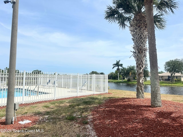 2464 Bayhill Dr, Melbourne, FL 32940 - view of yard featuring fence and a water view